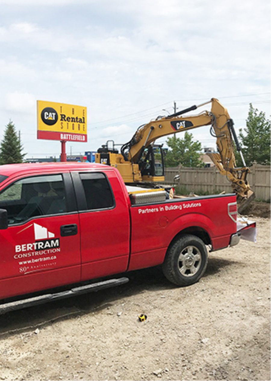 Red Bertram Construction truck on site